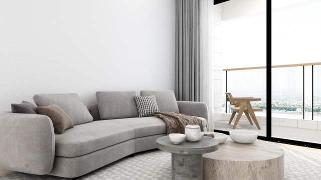 グレーのソファと開放感のあるリビング